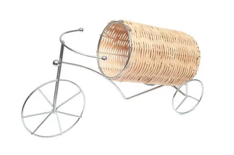 Support under a bottle with wine in the form of a bicycle with the wattled co Stock Photos