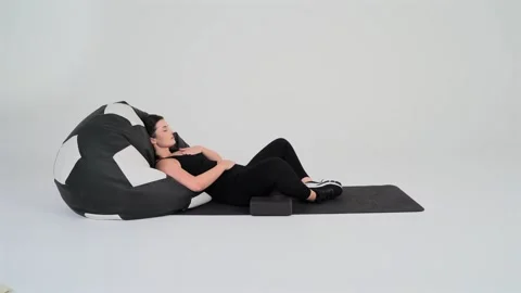 Supported Bound Angle Pose (Replaces Bhekasana - Frog Pose). Stock Footage 314186017