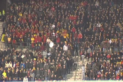 Supporters cheering in stadium fireworks Stock Footage 7751814