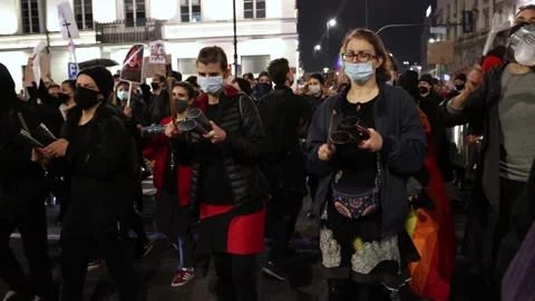 Supporters of pro choice marching in Warsaw city, Poland Stock Footage 141971986