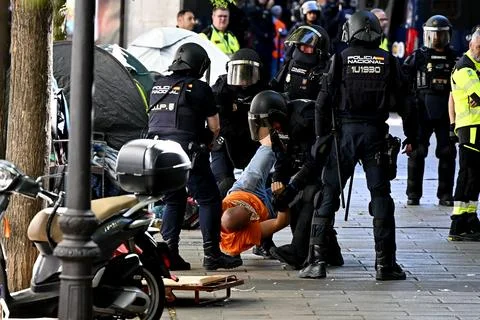 Supporters protest to prevent eviction of an 87-year-old woman in Madrid, Spain  Stock Photos