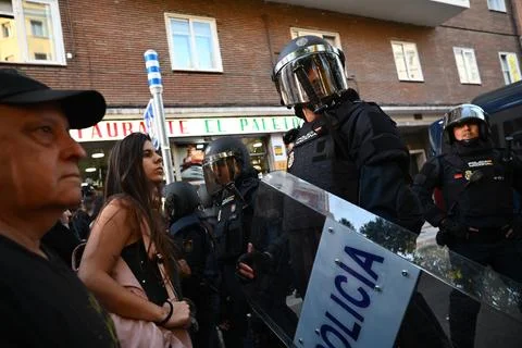 Supporters protest to prevent eviction of an 87-year-old woman in Madrid, Spain  Stock Photos