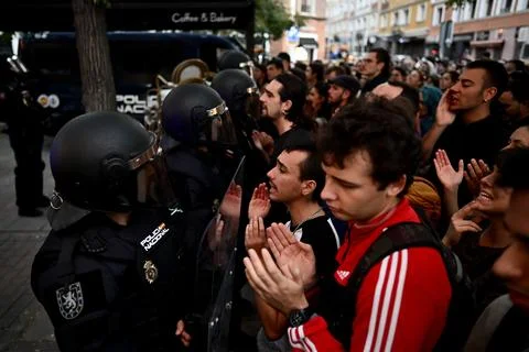 Supporters protest to prevent eviction of an 87-year-old woman in Madrid, Spain  Stock Photos