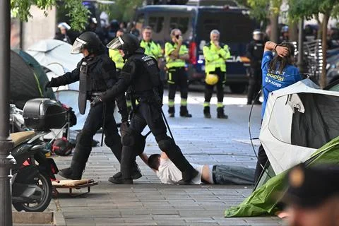 Supporters protest to prevent eviction of an 87-year-old woman in Madrid, Spain  Stock Photos