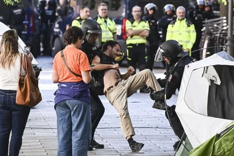 Supporters protest to prevent eviction of an 87-year-old woman in Madrid, Spain  Stock Photos