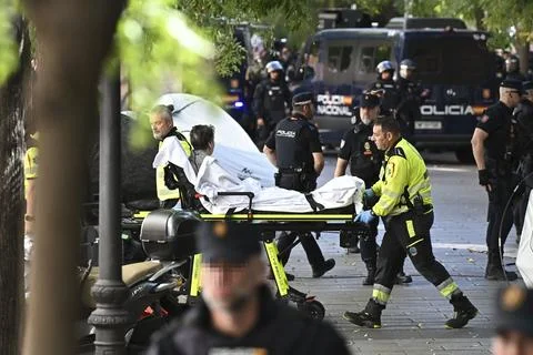 Supporters protest to prevent eviction of an 87-year-old woman in Madrid, Spain  Stock Photos