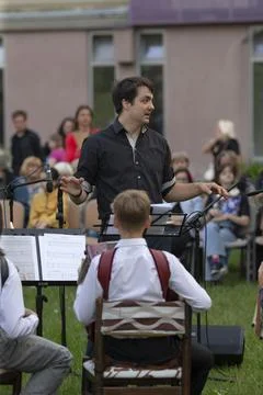 Supportive environment fostering learning during outdoor rehearsal session Stock Photos