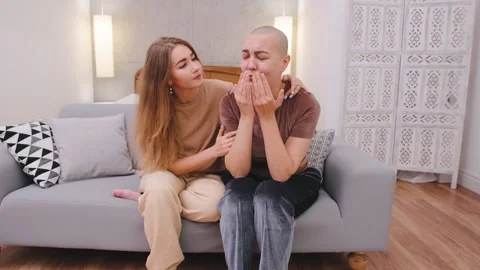 Supportive moment in a couple's therapy session at home focusing on communicatio Stock Footage 346154202