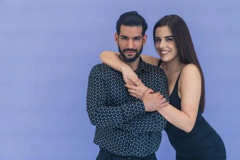 Supportive significant one. Isolated medium studio shot of a heterosexual couple Stock Photos
