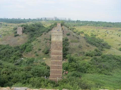 Supports of the destroyed bridge. Stock Photos