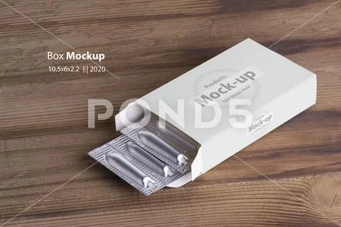 Suppositories loafs inside box on wooden table background mock-up series Plantilla PSD