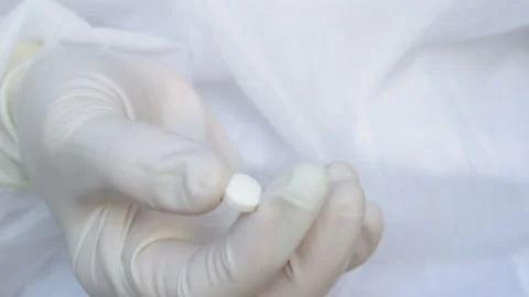 Suppositories in woman hands, Stock Footage 180076045