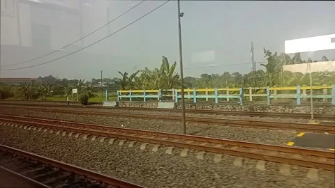 Surabaya East Java Indonesia. Train Journey: Departing. On June 17 2025 Stock Footage 311754211
