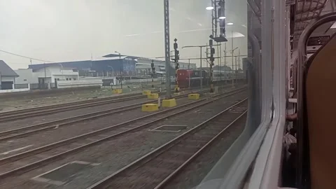 Surabaya East Java Indonesia. Train Journey: Departing. On June 17 2025 Stock Footage 313256290