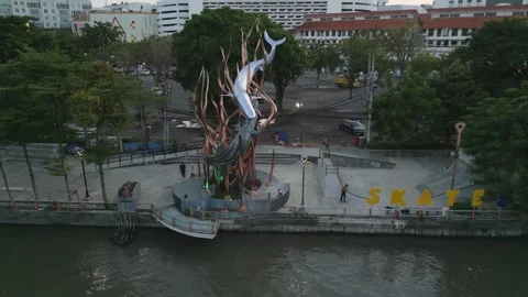 Surabaya, East Java - June 24 2025: Skate Park and Crocodile Shark statue Aerial Stock Footage 338038522