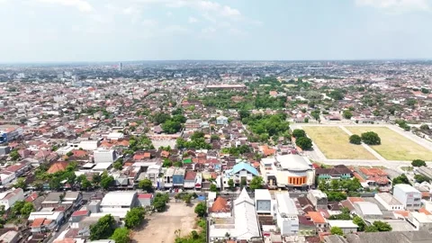 Surakarta city in Central Java, Indonesia. Aerial wide cityscape, urban Stock Footage 310283837