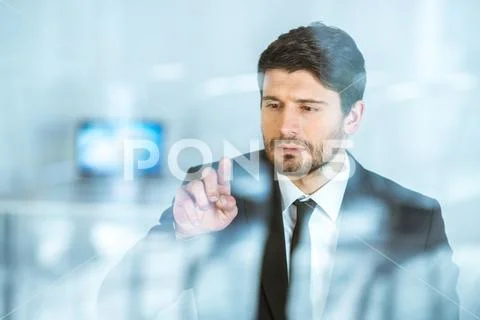 The sure businessman touch the virtual screen Stock Photos
