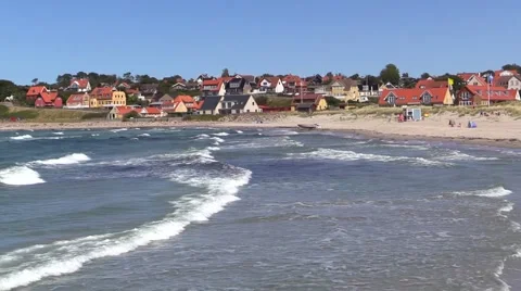 Surf and breakers on Hundested Beach, Hundested, Denmark on a sunny summer's day Stock-Footage 52313738