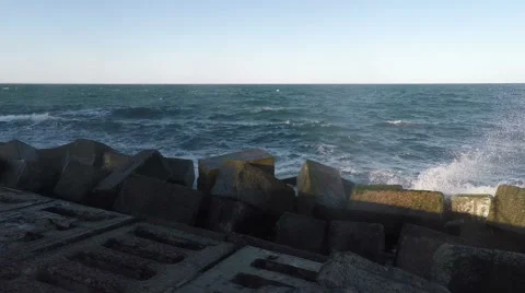 Surf and Rainbow at the Breakwater Stock Footage 50153305