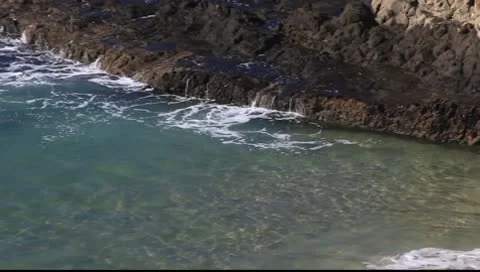 Surf and rock Stock Footage 8840093