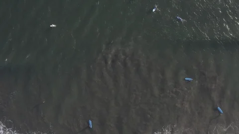 Surf and wave top down fly up Stock Footage 113120197