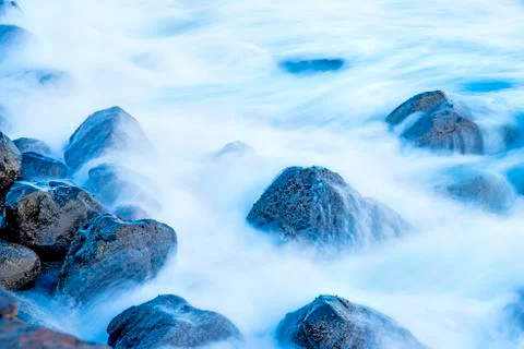 Surf of the atlantic ocean in long time exposure Stock Photos