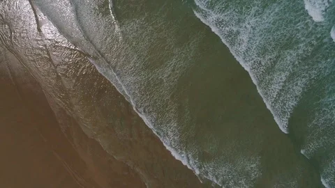 The surf, beach and waves and the seaside aerial view down 스톡 동영상 75932428