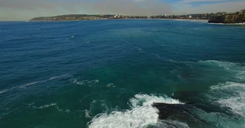 Surf beaking on rocks and reef Stock Footage 63392454