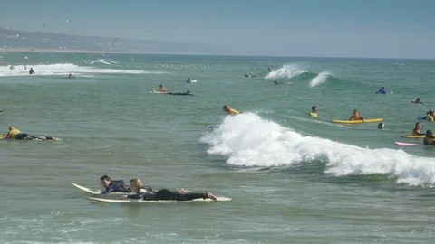 Surf Beginners Practicing In Ocean, Pan Видео 99227055
