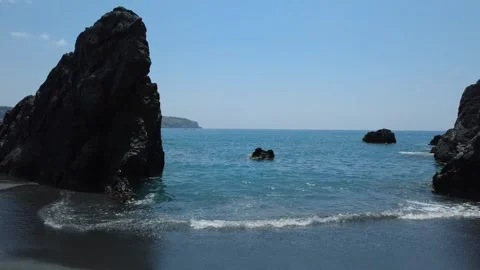 The surf between the rocks. Stock Footage 324858271