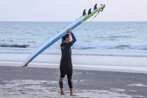 Surf board at the beach Stock Photos