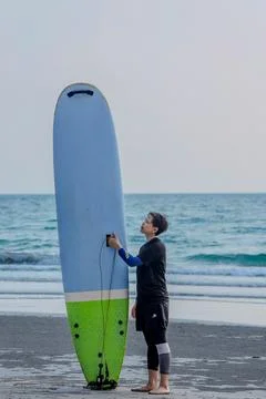Surf board at the beach Stock Photos