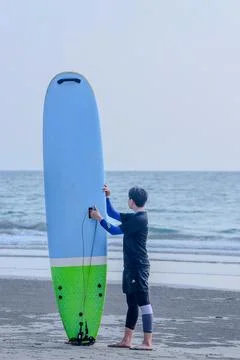 Surf board at the beach Stock Photos