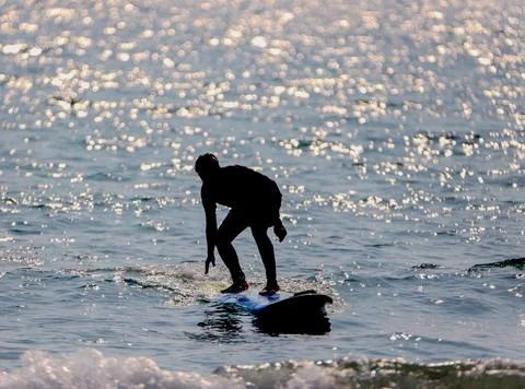 Surf board at the beach Stock Photos