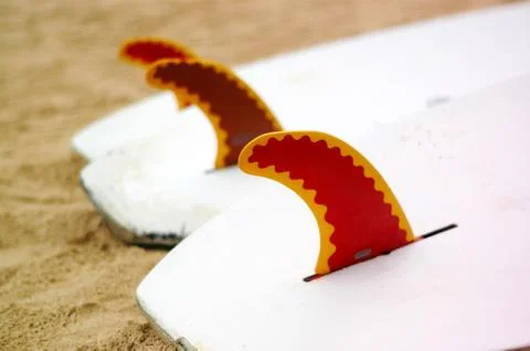 Surf boards on a beach Stock Photos