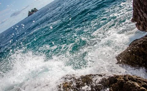 Surf on the cliffs of the Adriatic Sea Photos