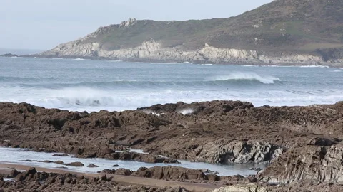 Surf at Combesgate beach next to Woolacombe in North Devon Stock Footage 142432815