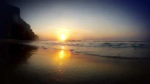 The surf at dawn Stock Footage 106464580