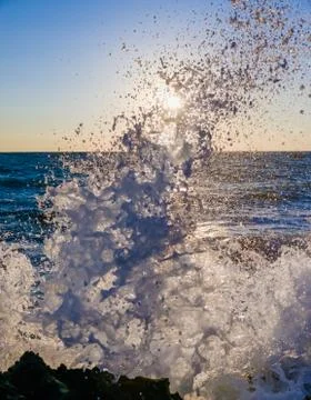 Surf at dawn Photos