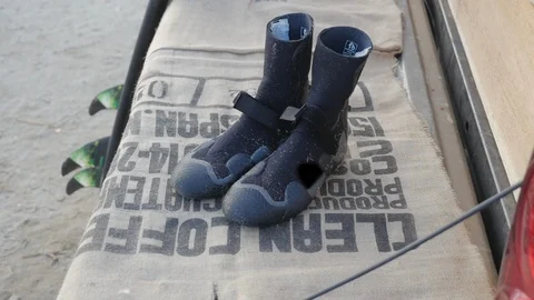 Surf Gear on The Beach Stock Footage 87715641