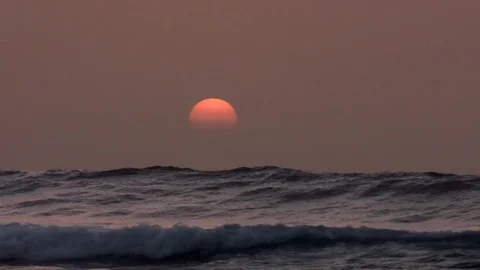 Surf jump at sunset Stock Footage 84378985