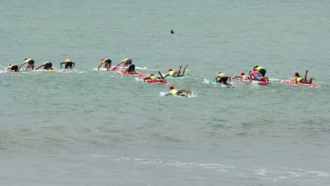 Surf Life Saving Contest, paddle boarding Stock Footage 254830059