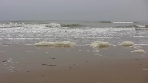 Surf at Omaha Beach,  just below the Normandy American World War 2 Cemetery Stock-Footage 80674180