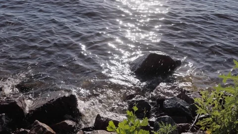 Surf on the rocky beach Stock Footage 90913891