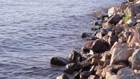 Surf on the rocky beach Stock Footage 90913959