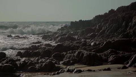Surf on the rocky shore Stock Footage 96513340