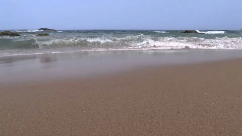 Surf on Sandy Beach. Slow Motion Stock Footage 106464371