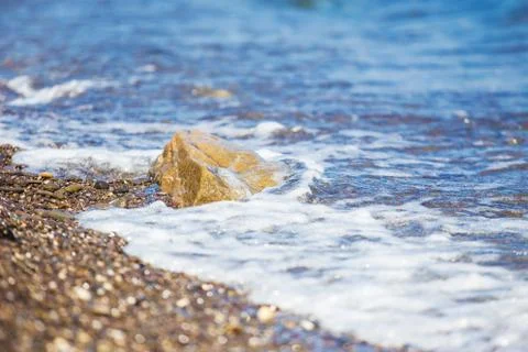 Surf on seashore Stock Photos