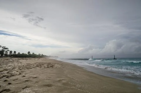 In the surf, on the shore of the ocean Stock Photos