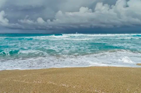 In the surf, on the shore of the ocean Stock Photos